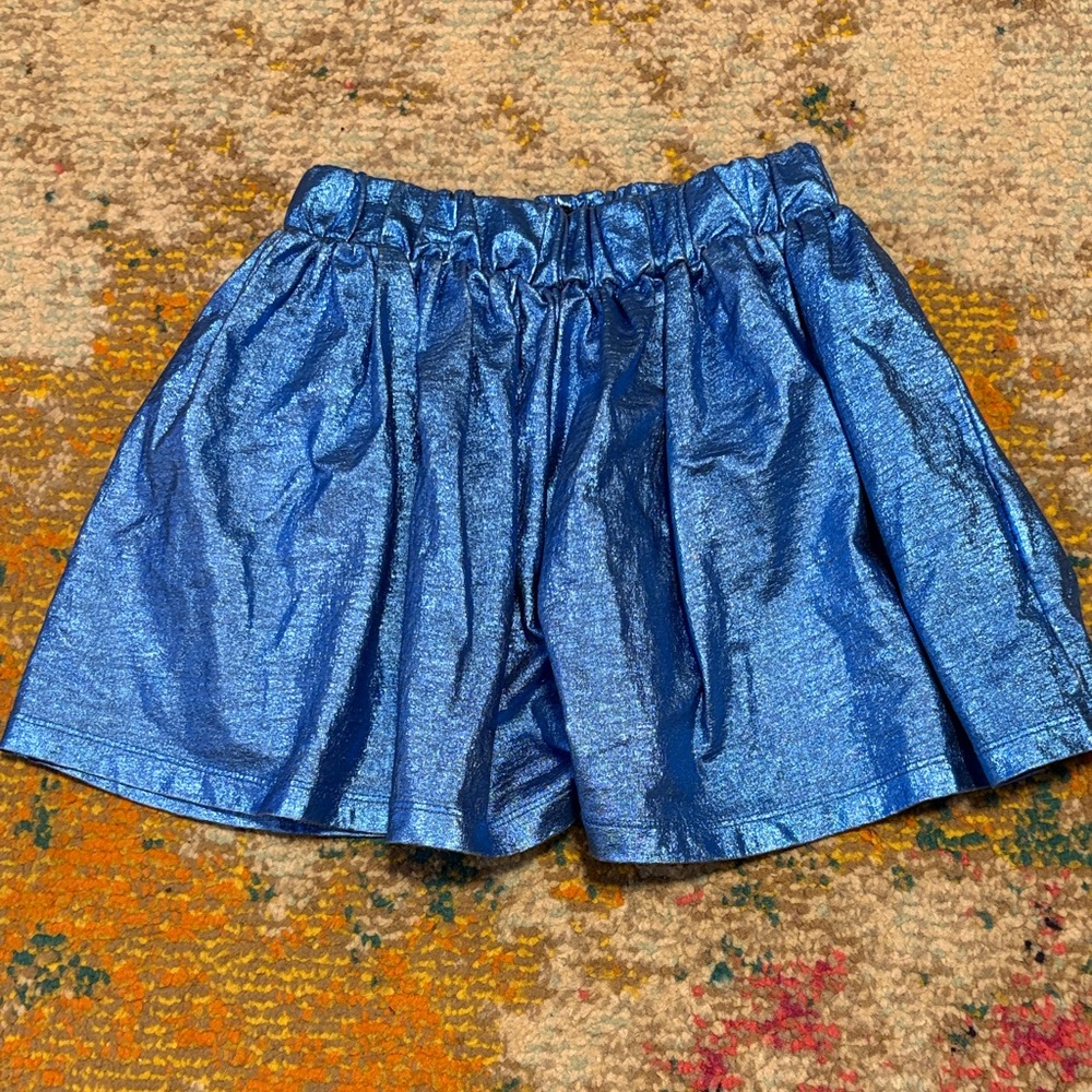 Finger in the nose metallic girls skirt